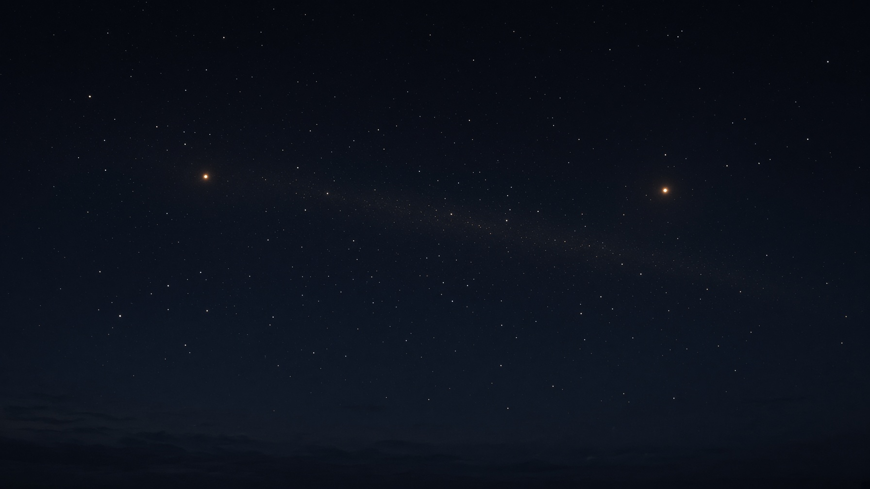 Two separate warm lights in a wide night sky, with a faint dust of gold between them that does not merge them. Made for this page.